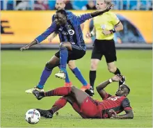  ?? CANADIAN PRESS FILE PHOTO ?? The Canadian Soccer Associatio­n has confirmed that 19-year-old midfielder Ballou Tabla, top, has chosen Canada over the Ivory Coast.
