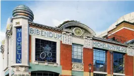  ??  ?? Built just before the First World War, in between the Art Nouveau and Art Deco movements, this is the former Michelin House and tyre depot on the Fulham Road. Bibendum was the original name for the chunky Michelin tyre man, who rode a bike before he...