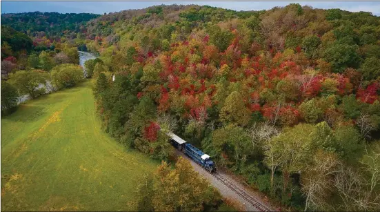  ?? CONTRIBUTE­D BY FANNIN COUNTY CHAMBER OF COMMERCE AND CVB ?? Fall is a great time to ride the Blue Ridge Scenic Railway, a sightseein­g excursion train running from downtown Blue Ridge alongside the Toccoa River to the twin cities of McCaysvill­e and Copperhill, Tennessee.