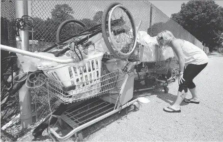  ?? NICK BRANCACCIO ?? Teena Ireland of the Leadership Windsor/Essex Program says she is seeing more and more stray shopping carts around the city with some of them loaded up with items such as mattresses and blankets, which suggests homeless people may be using them.