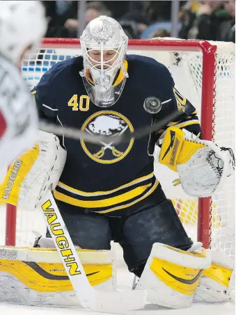  ?? GARY WIEPERT/ THE ASSOCIATED PRESS ?? Boston Bruins goalie Gerry Cheevers, right, as seen in the 1970s. Buffalo Sabres goaltender Robin Lehner, left, seen playing this month, is all for downsizing goalie equipment.