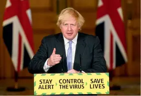  ?? AP ?? Prime Minister Boris Johnson speaks during a media briefing at Downing St, London, yesterday (local time), announcing a loosening of Covid-19 lockdown restrictio­ns.