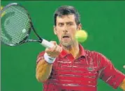  ?? AFP ?? Novak Djokovic of Serbia beat Canadian Denis Shapovalov in straight sets to enter the last 16 at Shanghai Masters.