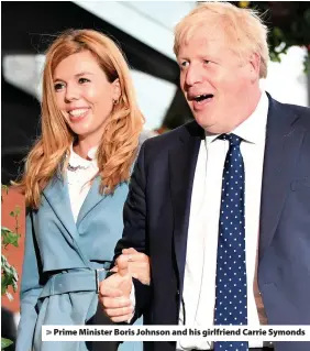  ??  ?? > Prime Minister Boris Johnson and his girlfriend Carrie Symonds