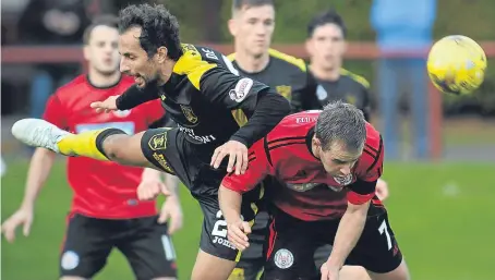  ?? Picture: George McLuskie. ?? Brechin’s Alan Trouten challenges Raffaele De Vita.