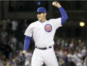  ?? CHARLES REX ARBOGAST — THE ASSOCIATED PRESS FILE ?? In this file photo, Chicago Cubs’ Anthony Rizzo throws his first ever major league pitch in relief during the ninth inning of a baseball game against the Arizona Diamondbac­ks in Chicago. Pablo Sandoval made his debut on the mound this season. So have infielders Jose Reyes and Anthony Rizzo. The use of position players has become an increasing trend in baseball this season, especially in blowouts to save wear and tear on the bullpen.