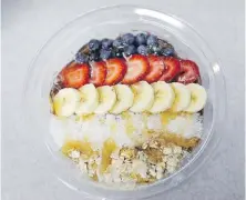  ?? LYNNE SLADKY, THE ASSOCIATED PRESS ?? Freshly made acai bowl at Mendez Fuel convenienc­e store in Miami includes bananas, strawberri­es and blueberrie­s.