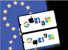  ?? — AFP photo ?? Apple and other big tech companies deemed “gatekeeper­s” – Google parent Alphabet, Amazon, Meta, Microsoft and TikTok owner ByteDance – have until March 7 to come into line with the DMA.
