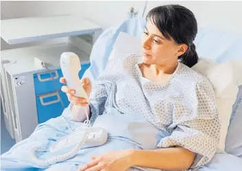  ??  ?? It’s good to talk... receiving a call from a relative can help during a hospital stay