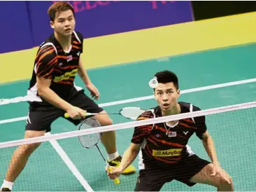  ??  ?? Determined: Ong Yew Sin (right) and Teo Ee Yi said they intend to break their first-round-loss jinx at next week’s Hong Kong Open.