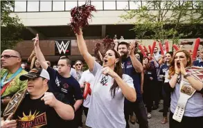  ?? Hearst Connecticu­t Media file photo ?? Stephanie McMahon, center, has resigned as WWE's co-CEO and chairwoman. In June 2019, she attended aSpecial Olympics rally outside WWE's headquarte­rs at 1241 E. Main St., in Stamford.