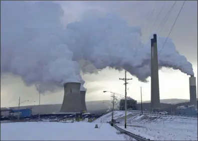  ?? (Todd Berkey/The Tribune-Democrat via AP) ?? Steam billows from the Conemaugh Generation Station in New Florence, Pa. in this file photo. Stricter pollution controls have placed the power plant on a list of facilities to be closed.