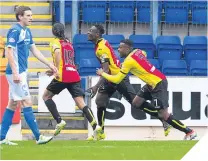  ??  ?? Abdul Osman (centre) celebrates.