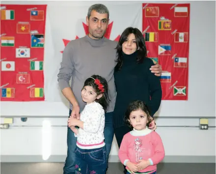  ?? CITIZEN PHOTO BY JAMES DOYLE ?? Orwa Gharzaldin, Souher Alshoufi, six-year-old Tala Gharzaldin and three-year-old Farah Gharzaldin pose for a photo on Tuesday at IMSS. The family are the newest arrivals from Syria, having landed in Prince George on Friday afternoon.