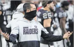  ?? Benjamin Hager Las Vegas Review-journal @benjaminhp­hoto ?? Raiders quarterbac­k Derek Carr puts his hands up in frustratio­n during Thursday’s loss to the Los Angeles Chargers. Carr hurt his groin in the game.