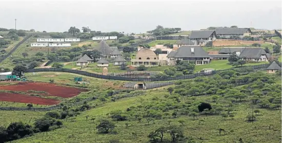  ?? Pictures: THEMBINKOS­I DWAYISA ?? MONUMENT OF SHAME: President Jacob Zuma’s homestead in Nkandla, where ‘security’ upgrades included a chicken run and a spaza shop