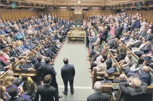  ??  ?? MPs gather in the House of Commons the first sitting since the election which resulted in a hung Parliament.