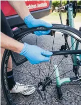  ??  ?? Remove the flat tube from within the tire