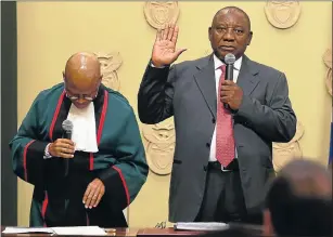  ?? Picture: KOPANO TLAPE/GCIS ?? SWORN IN: President Cyril Ramaphosa, right, takes the oath of office administer­ed by Chief Justice Mogoeng Mogoeng at his swearing-in at Tuynhuis in Cape Town