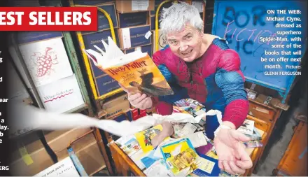  ?? Picture: GLENN FERGUSON ?? ON THE WEB: Michael Clyne, dressed as superhero Spider-Man, with some of the books that will be on offer next month.