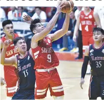  ?? ALVIN S. GO ?? THE SAN BEDA RED LIONS swept rivals Letran Knights in their season series in NCAA Season 94 after taking their second-round encounter, 74-68, on Tuesday.