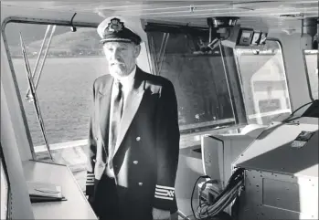  ?? 01_B03twe03 ?? Captain Ian Dewar is pictured on the bridge of the MV Clansman during a special Clyde cruise chartered by the Clyde River Steamer Club.