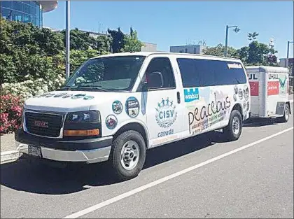  ?? SUBMITTED PHOTO ?? The Peace Bus, a CISV program, takes youth delegates through Canadian communitie­s where they volunteer and take part in other learning activities.