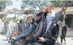  ?? AFP ?? Taliban militants ride a motorbike during Ramadan last week.