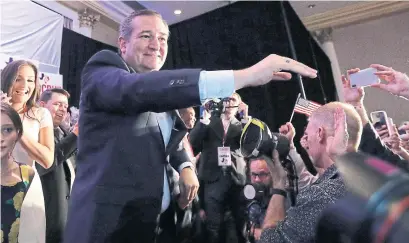  ?? DAVID J. PHILLIP THE ASSOCIATED PRESS ?? Senator Ted Cruz greets supporters at his election night party on Tuesday in Houston after beating Democrat Beto O’Rourke.