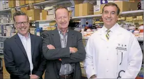  ?? Lake Fong/Post-Gazette ?? From left, Michael Hufford, LyGenesis CEO; Eric Lagasse, chief scientific officer; and Paulo Fontes, chief medical officer, in the lab at McGowan Institute Regenerati­ve Medicine in Oakland.