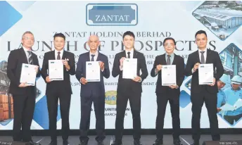  ?? ?? Chan (third right) alongside other directors from Zantat and M&A Securities during Zantat’s prospectus launch yesterday.