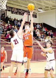  ?? RANDY MOLL/ EAGLE-OBSERVER ?? Farmington senior Carson Simmons scored 11 points as the Cardinals roared past Gentry, 75-24, in 4A-1 boys basketball action on Tuesday, Jan. 26.