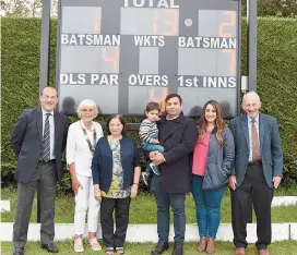  ??  ?? The visitors are shown the new electronic scoreboard by club officials.