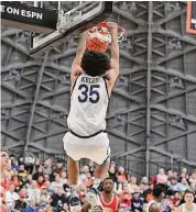  ?? ?? Yale’s Isaiah Kelly dunks against Cornell during Saturday’s Ivy League semifinal.