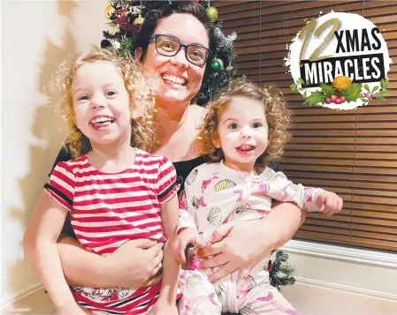  ?? Picture: Scott Powick ?? Bowel cancer survivor Carly Hayne with children April, 3, and Georgia, 1, was given a year to live.