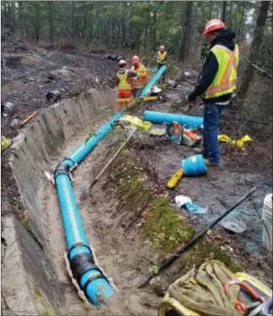  ?? Special toThe Daily Courier ?? A new city water line was routed through an abandoned irrigation flume in Myra-Bellevue provincial park. The budget for Kelowna’s takeover of the Southeast Kelowna Irrigation District was $98 million, but “final costs” are still to come, council heard Monday afternoon.