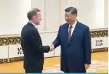  ?? — AFP ?? BEIJING: US National Security Advisor Jake Sullivan (left) shakes hands with China’s President Xi Jinping during their meeting at the Great Hall of the People in Beijing on August 29, 2024.