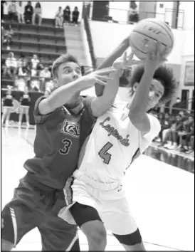  ?? ?? dominated all of their opponents with a margin of 20 or more plus points this season.
Bottom left:
Malvern’s Donta Cagle muscles the ball away for a possession against Arkadelphi­a’s True-freshman James Elgas.