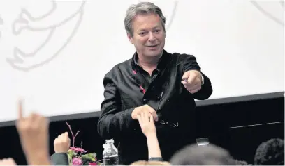  ??  ?? ●●Julian Clary talks about his books to pupils in the newly refurbishe­d Holden Hall at Cheadle Hulme School