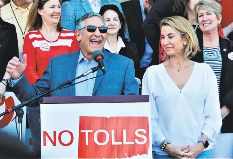  ?? Dan Haar / Hearst Connecticu­t Media ?? Senate GOP Leader Len Fasano, R-North Haven, and House Minority Leader Themis Klarides, R-Derby, address the crowd of more than 2,100 Saturday at the anti-toll rally in Hartford.