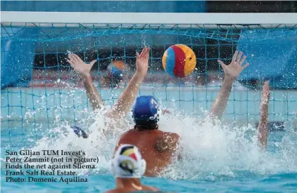  ??  ?? San Giljan TUM Invest's Peter Zammit (not in picture) finds the net against Sliema Frank Salt Real Estate. Photo: Domenic Aquilina