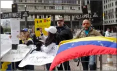  ??  ?? Venezuelan citizens living in Brazil protest against Venezuelan President Nicolas Maduro, outside Sao Paulo's City Hall as the Foreign Ministers of Mercosur meet in Sao Paulo, Brazil, Aug. 5, 2017. AP PHOTO/ANDRE PENNER