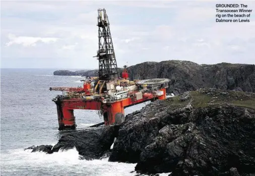  ??  ?? GROUNDED: The Transocean Winner rig on the beach of Dalmore on Lewis