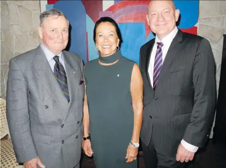  ?? PHOTOS, BILL BROOKS ?? From left, at a reception held in the home of Ann McCaig to recognize Mount Royal University’s Military Memorial Bursaries Campaign are guest of honour, keynote speaker and retired general John de Chastelain, McCaig and MRU president David Docherty.