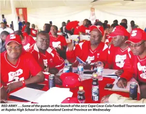  ??  ?? RED ARMY . . . Some of the guests at the launch of the 2017 Copa Coca-Cola Football Tournament at Rujeko High School in Mashonalan­d Central Province on Wednesday