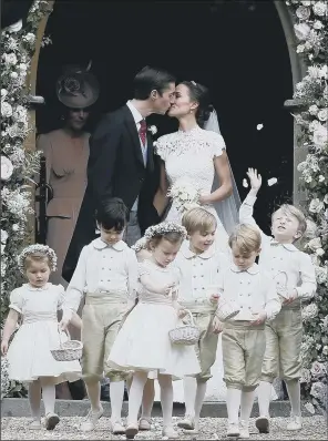  ?? PICTURES: KIRSTY WIGGLESWOR­TH/PA WIRE. ?? SOCIETY WEDDING: Prince George (second right) leaves with other page boys and flower girls following the wedding of Pippa Middleton and her husband James Matthews.