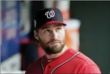  ?? THE ASSOCIATED PRESS ?? Nationals’ Daniel Murphy looks out at the field during the second inning of Sunday’s game.