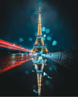  ??  ?? Left SYMMETRY,
LONDON
“I love using leading lines and symmetry. Having a focus point for the viewer’s eye
to be drawn to is a great way to engage a person’s attention”
Above EIFFEL TOWER,
PARIS
“Using the puddle and raindrops on the lens give the feel of what it was like that night. I also wanted to get the traffic blurs for a sense of movement”