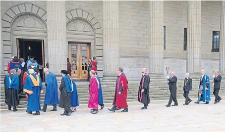  ?? Picture: Kim Cessford. ?? Dignitarie­s parade into a Dundee University graduation ceremony at the Caird Hall.
