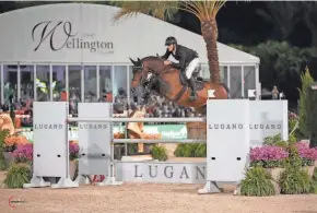  ?? ?? Richard Vogel and United Touch won the “Saturday Night Lights” $385,000 Lugano Diamonds Grand Prix at the Winter Equestrian Festival.